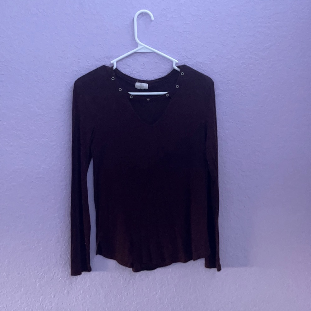 A maroon dressy shirt